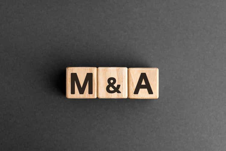 M&A - acronym from wooden blocks with letters