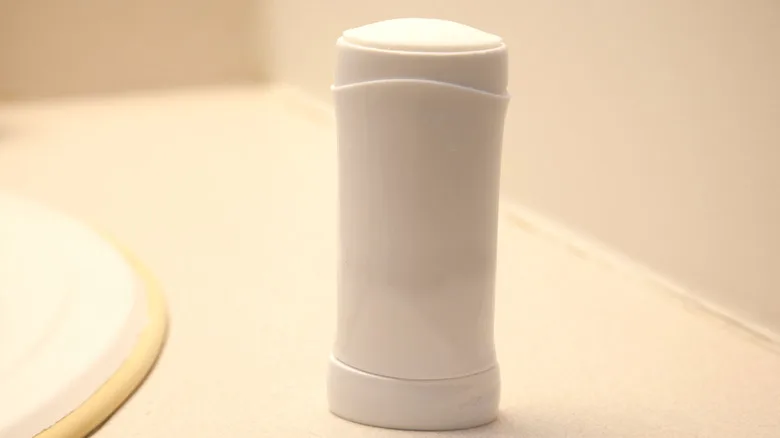 A white stick of deoderant displayed on a white background
