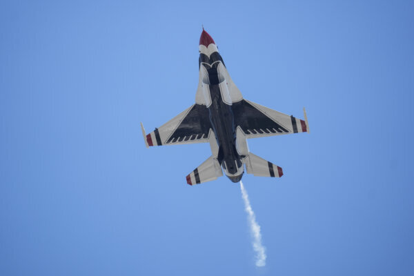 A United States Air Force Thunderbird flies over Wrigley Field during the sixth inning of a baseball game between the Pittsburgh Pirates and Chicago Cubs, Friday, Aug. 15, 2025, in Chicago. (AP Photo/Erin Hooley)