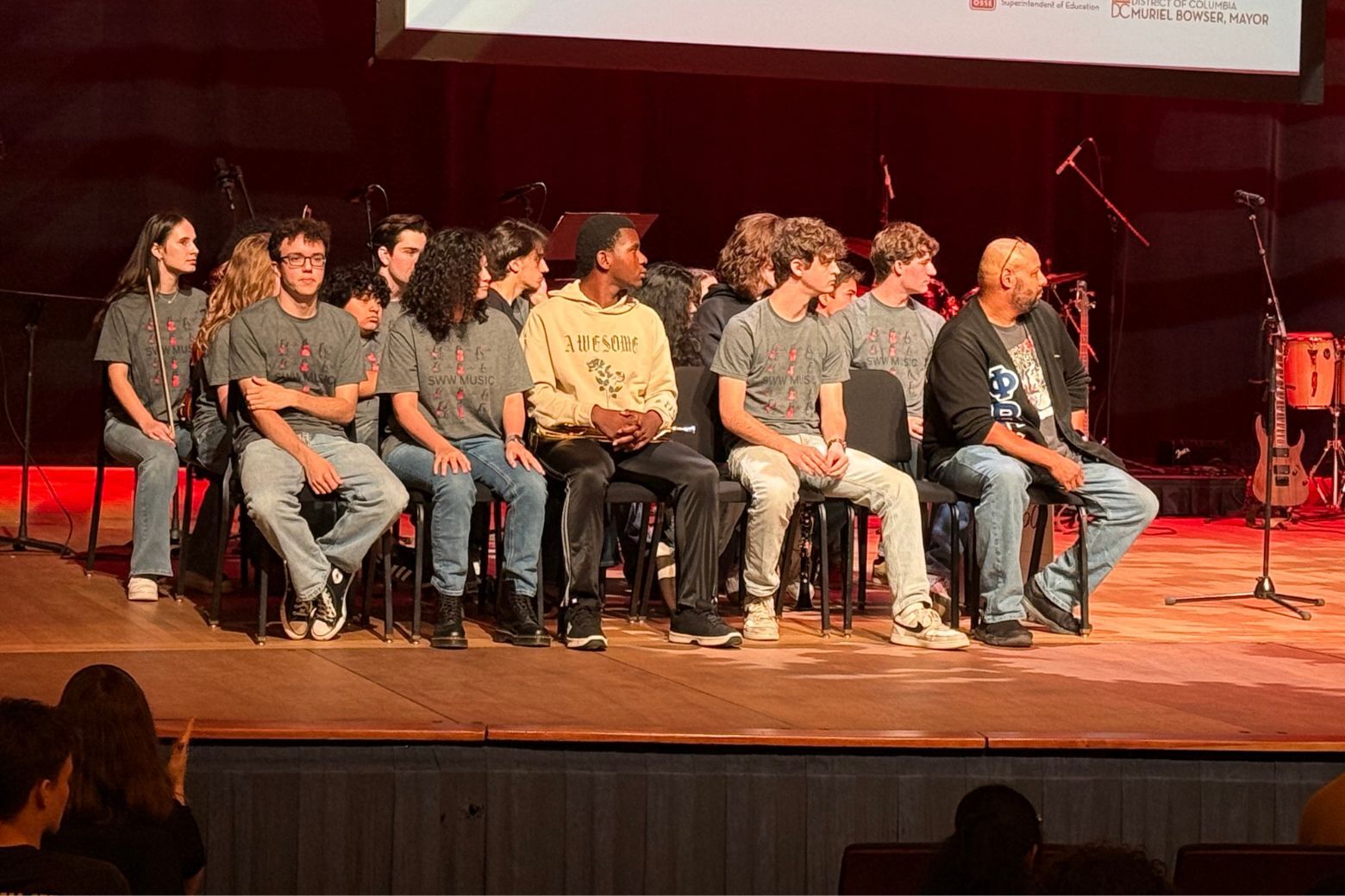 Christopher Alberts' students sit on stage
