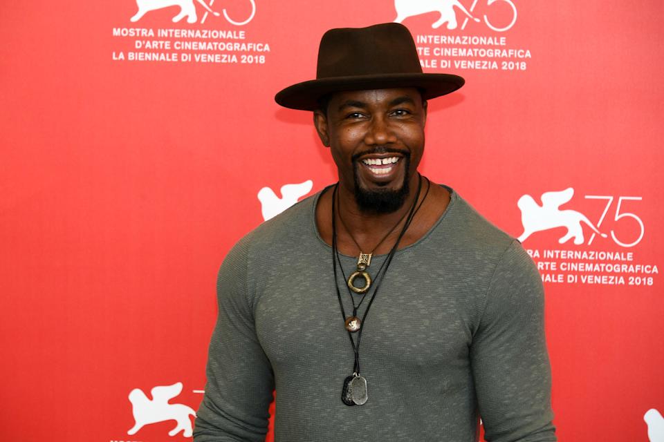 Michael Jai White smiling on the red carpet. (Photo by Dominique Charriau/WireImage)<p>Photo by Dominique Charriau&sol;WireImage</p>